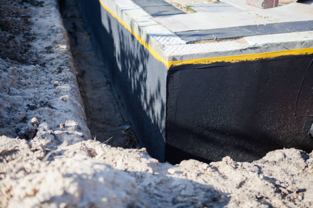 Professional Waterproofing technician working in North Evans, NY